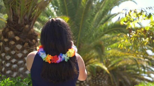 Woman taking picture in Hawaii in slow motion 180fps
