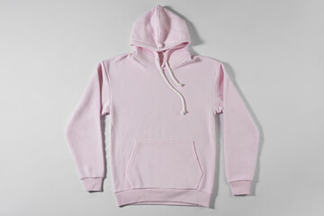 Casual pink hoodie on light background