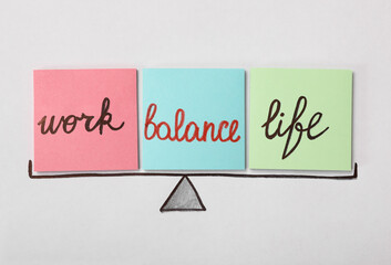 Scales image with sticky notes on white background, flat lay. Life and work balance concept