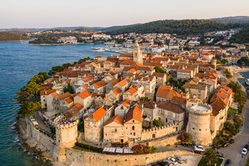 Fototapeta na wymiar Dramatic aerial view of the famous Korcula old town by the Adriatic sea in Croatia