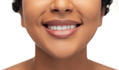 close up of face of smiling african american woman