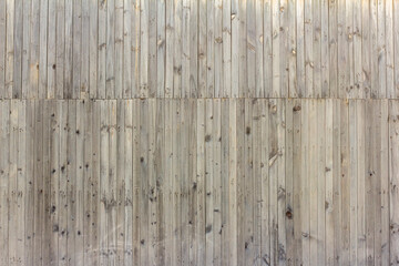Natural wooden background.An old wooden wall darkened with age.