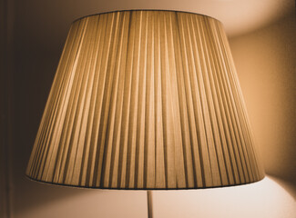 floor lamp with warm light and reflection in the window