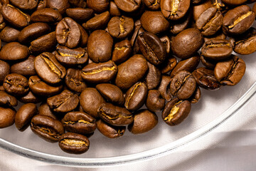 Many roasted coffee beans close up