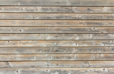 Obraz premium Natural wooden background.An old wooden wall darkened with age.