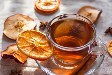 Cup of tea and slices of dried orange