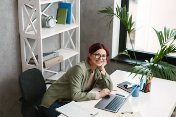 Young mid aged woman entrepreneur