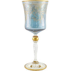 Colored wine glass with square edge. Bohemian art glassware vintage luxury stemware decorated with gold ornaments. Retro crystal goblet isolated on white background with clipping path. 