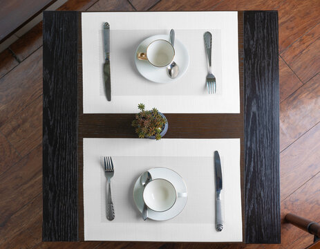 Blank white table placemat on cafe table from a top angle view