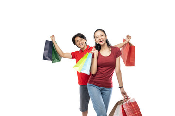 Happy young Asian couple bring many shopping bag colorful and with happy expression isolated white background