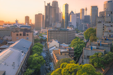 Golden light sunrise or sunset cityscape view of downtown Sydney Central Business District (CBD)...