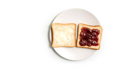 Butter and Jam or Jelly sandwich in a white plate on a white background - top view
