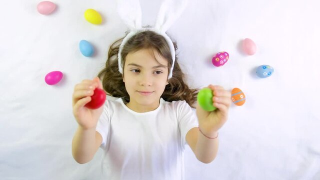 Child concept happy easter with eggs. Selective focus. Kid.