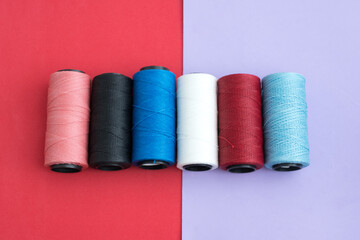 Set of yarns on a colored background