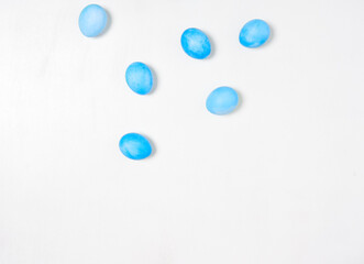 Easter eggs on white background. Easter concept. Top view.