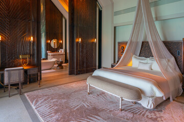 Luxurious interior of a very expensive rich water villa in the Maldives, decorated with natural wood.