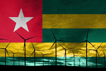 Togo flag wind farm at sunset, sustainable development, renewable energy