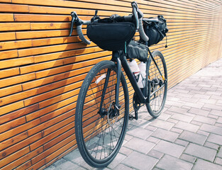 The bicycle packed with a lot of bags and other equipment ready for adventure and travel