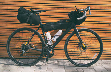 The bicycle packed with a lot of bags and other equipment ready for adventure and travel