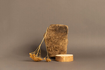 Abstract podium made of natural natural materials wood stone brown background
