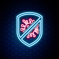 Glowing neon line Stop virus, bacteria, germs and microbe icon isolated on brick wall background. Antibacterial and antiviral defence, protection infection. Colorful outline concept. Vector