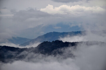 Panoramic view of ridges with cloud, silvery mist