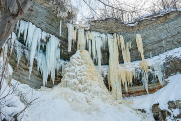 Fototapeta na wymiar Frozen Valaste waterfall. Ida-Viru County, Estonia