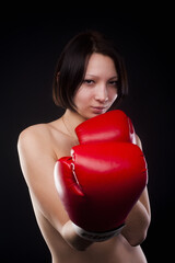 beautiful nude girl with boxing gloves