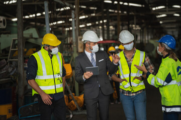 Team technician maintance standing talking manual worker. inspector man in factory industry safety service workshop solution. teamwork engineer expertise innovate.