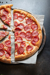 pizza cheese, sausage, tomato sauce meal top view copy space food background rustic