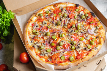 vegetable pizza no meat no cheese snack fast food vegan or vegetarian food savory pie meal top view copy space food background rustic 