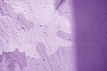 Purple colored wall background or texture with shades.