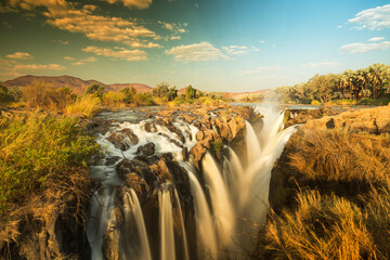Beautiful Epupa falls in Namibia on the border with Angola. Wild nature.