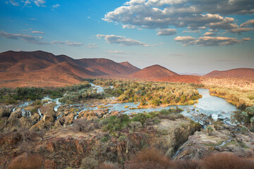 Beautiful Epupa falls in Namibia on the border with Angola. Wild nature.