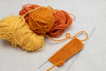 Needlework. Threads of wool yarn, set of knitting needles