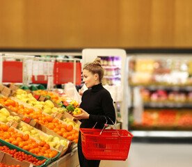 Woman buying fruits at the market