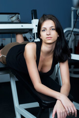 Young attractive woman in sport club