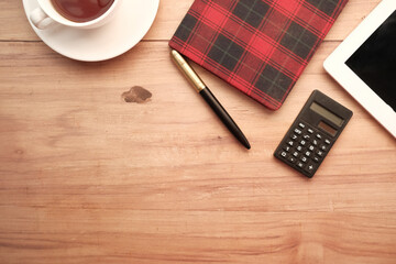 high angle view of modern workplace digital tablet, notepad 