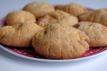 pies with potatoes. homemade pies with filling on a plate