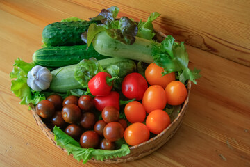 Red and green vegetables in the basket.