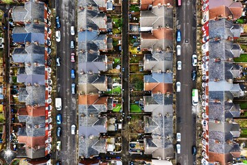 Aerial view of rows of terraced houses and back yards