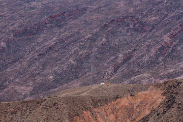 Natural background. View of the mountain and precipice. Beautiful rock texture, pattern and colors. 