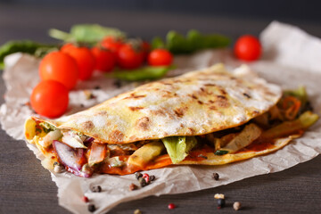 Mexican tacos on a wooden surface