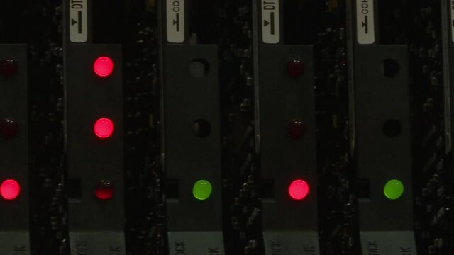 Red network connection indicators. Server room with rack servers. Cloud computing in the data center, information storage.