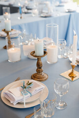 atmospheric candle decor with live fire on the banquet table