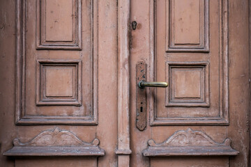old wooden door with handle
