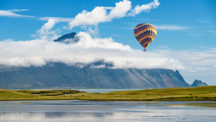 Adventure in Iceland , hot air balloon over Vestrahorn mountain
