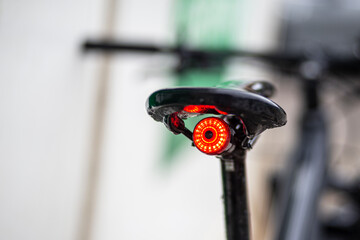 Red security light tied on a bicycle seat