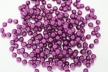 purple and white beads