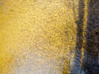 A brook  river stream  in Bavaria, aerial view photographed with a drone in winter